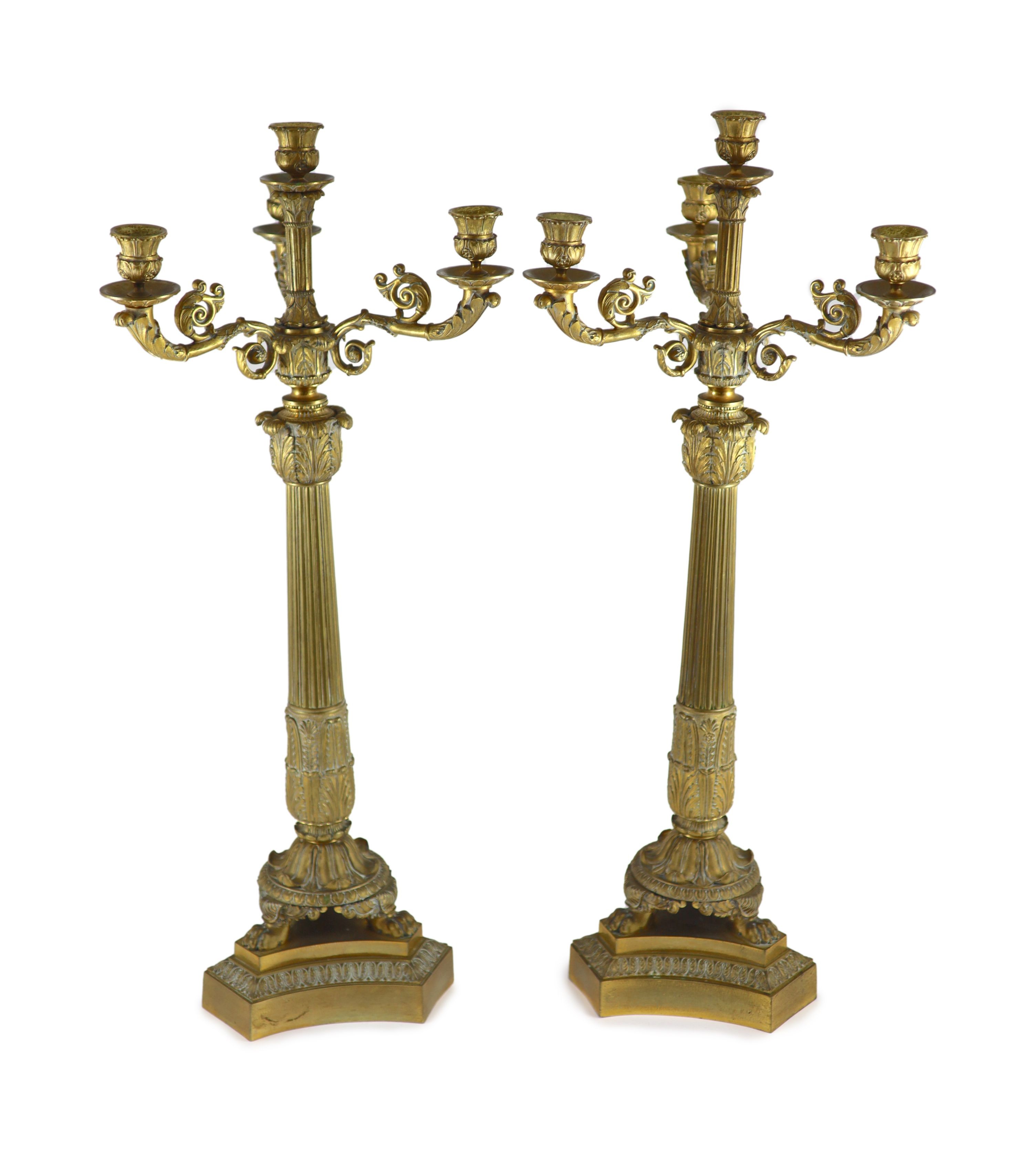 A pair of 19th century French Empire style ormolu candelabra height 70.5cm
